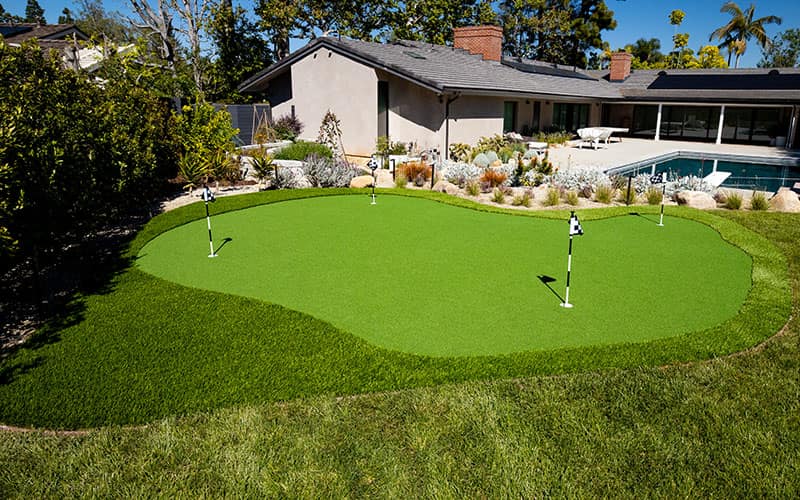 Backyard artificial putting green installed by HaloTurf