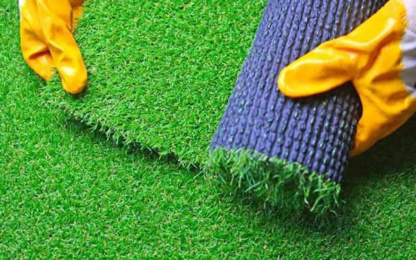 HaloTurf crew cleaning artificial turf
